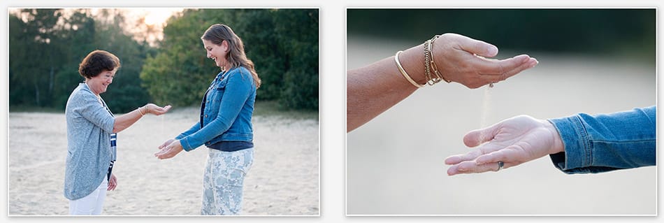 Handen van moeder en dochter