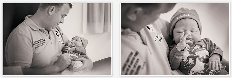 Pasgeboren baby in de arm van zijn vader