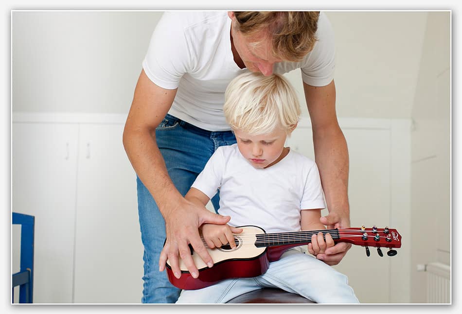 Gitaar spelen met papa