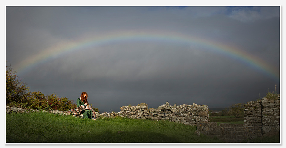 Familiefotografie met regenboog