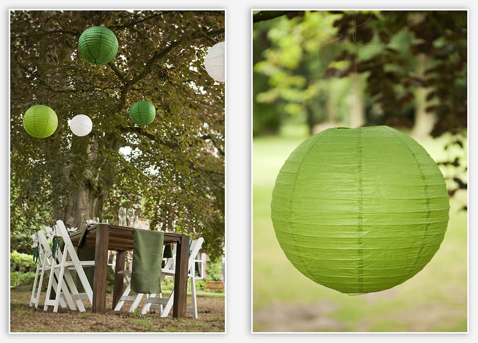 Lampionnen van rijstpapier boven de tafel
