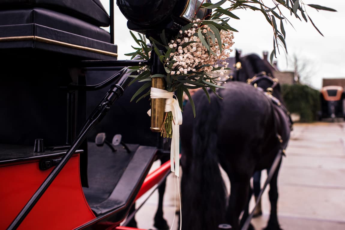 Koets met Friese paarden