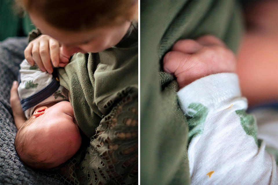 Moeder geeft borstvoeding en baby houd haar trui tussen zijn knuistjes